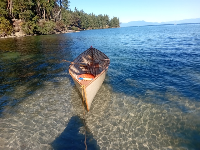 Picture of Learning Curve in the water on a sunny fall day, almost a year after I started to build her.
